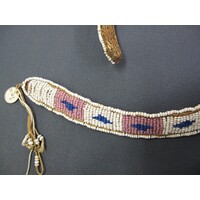 Circular label with metal outline tied to object