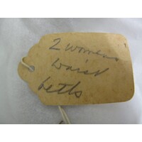 Small paper label tied to object